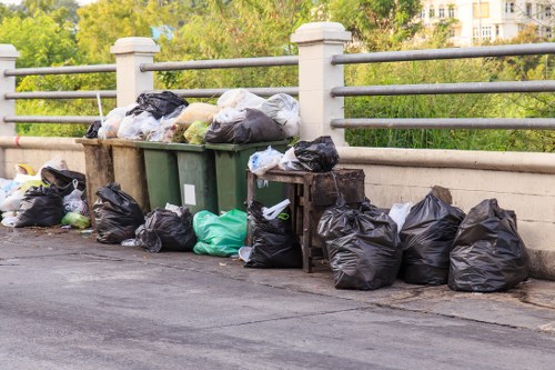 Commercial waste collection trucks in Oxted